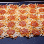 crispy onion cheese sheet pan with parmesan and salami